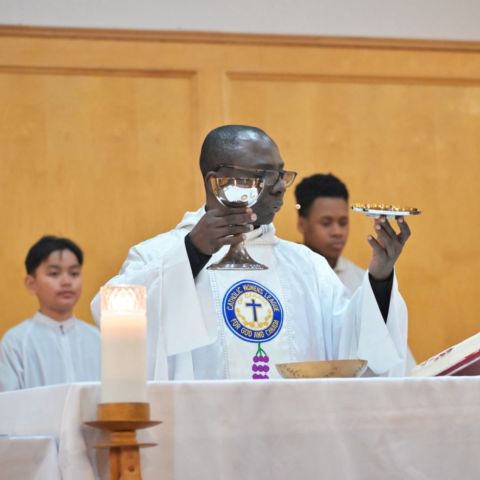 father clement saying mass